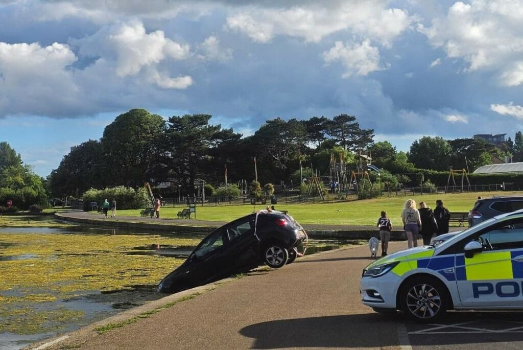Car ends up in boating lake in Poole Park